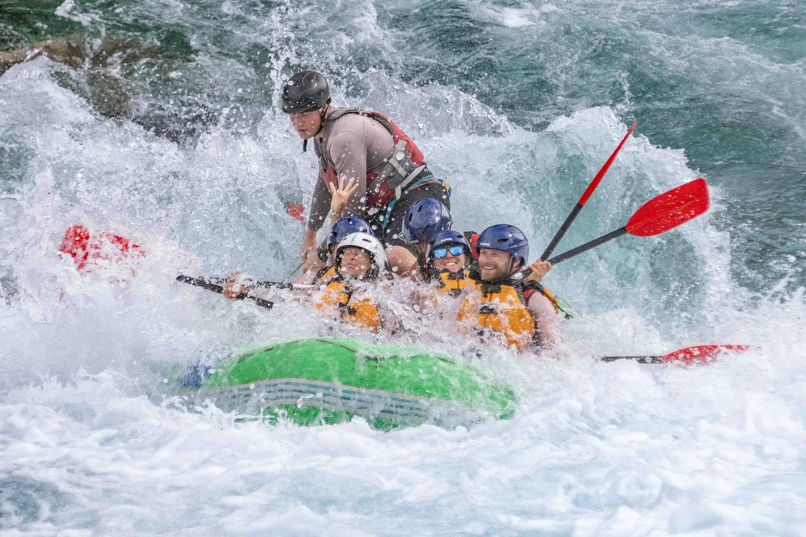 A group on a guided whitewater rafting tour on the Raundal river, one of the top things to do in Voss, Norway for a day