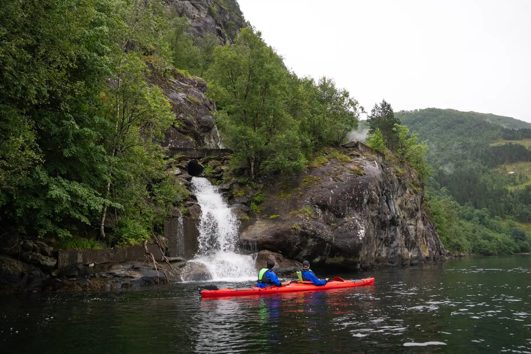 Kayakers exploring Hardangerfjord on a guided tour from Voss, Norway