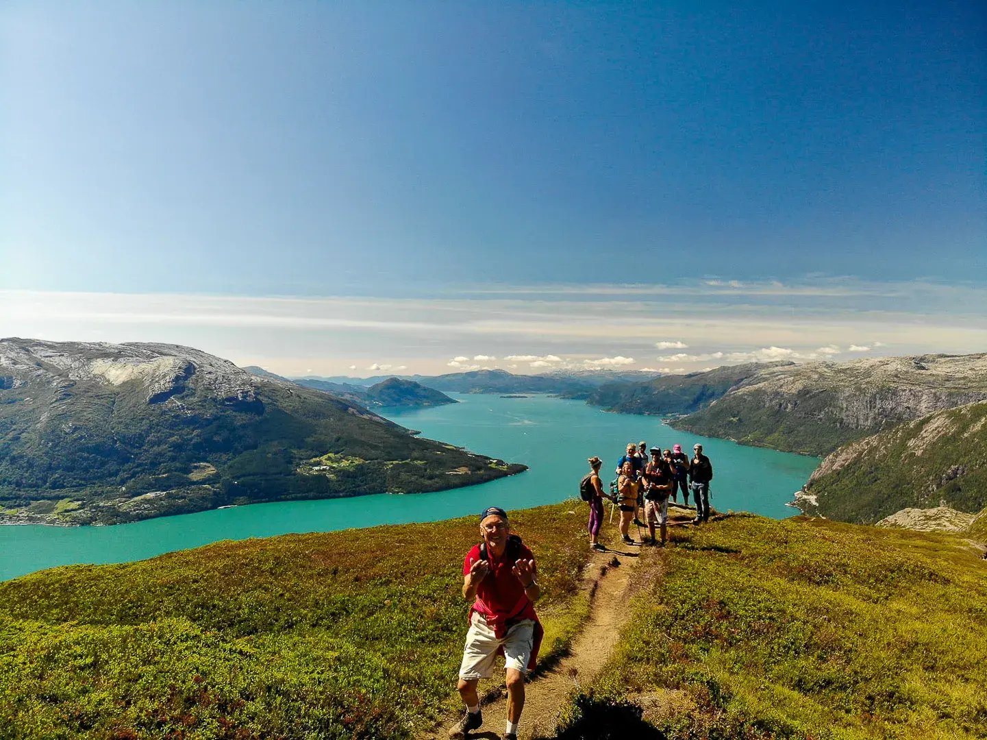 Hikers posing among the scenic fjords of Western Norway near Voss