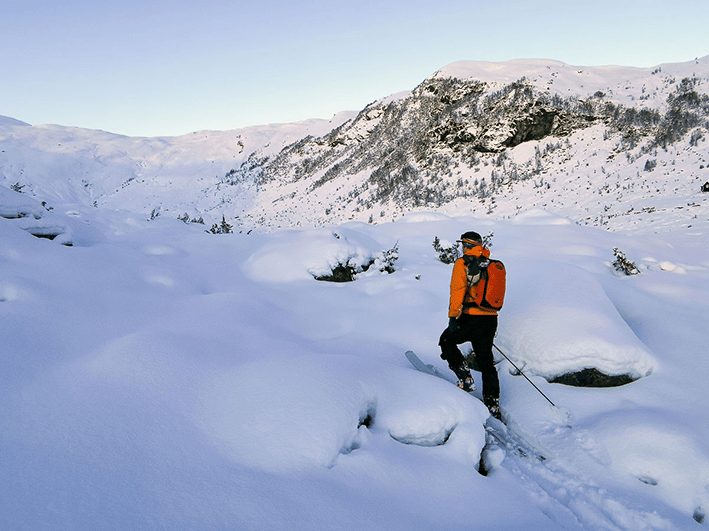 Man off-piste skiing on an Outdoor Norway guided tour