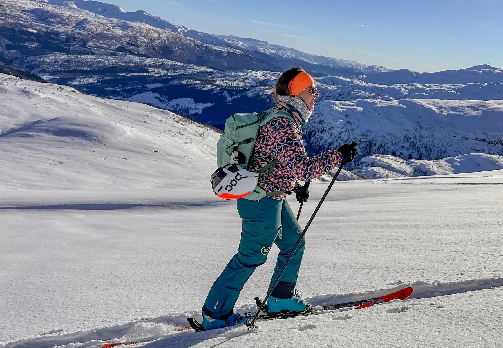 Woman ski touring near Naeroyfjord and Hardangerfjord on a guided tour with Outdoor Norway