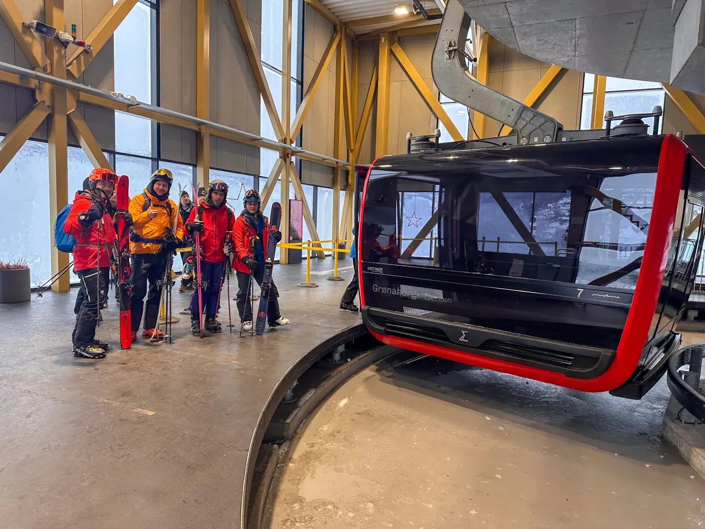 Skiers waiting on the Voss Gondola on a guided skiing tour in Norway