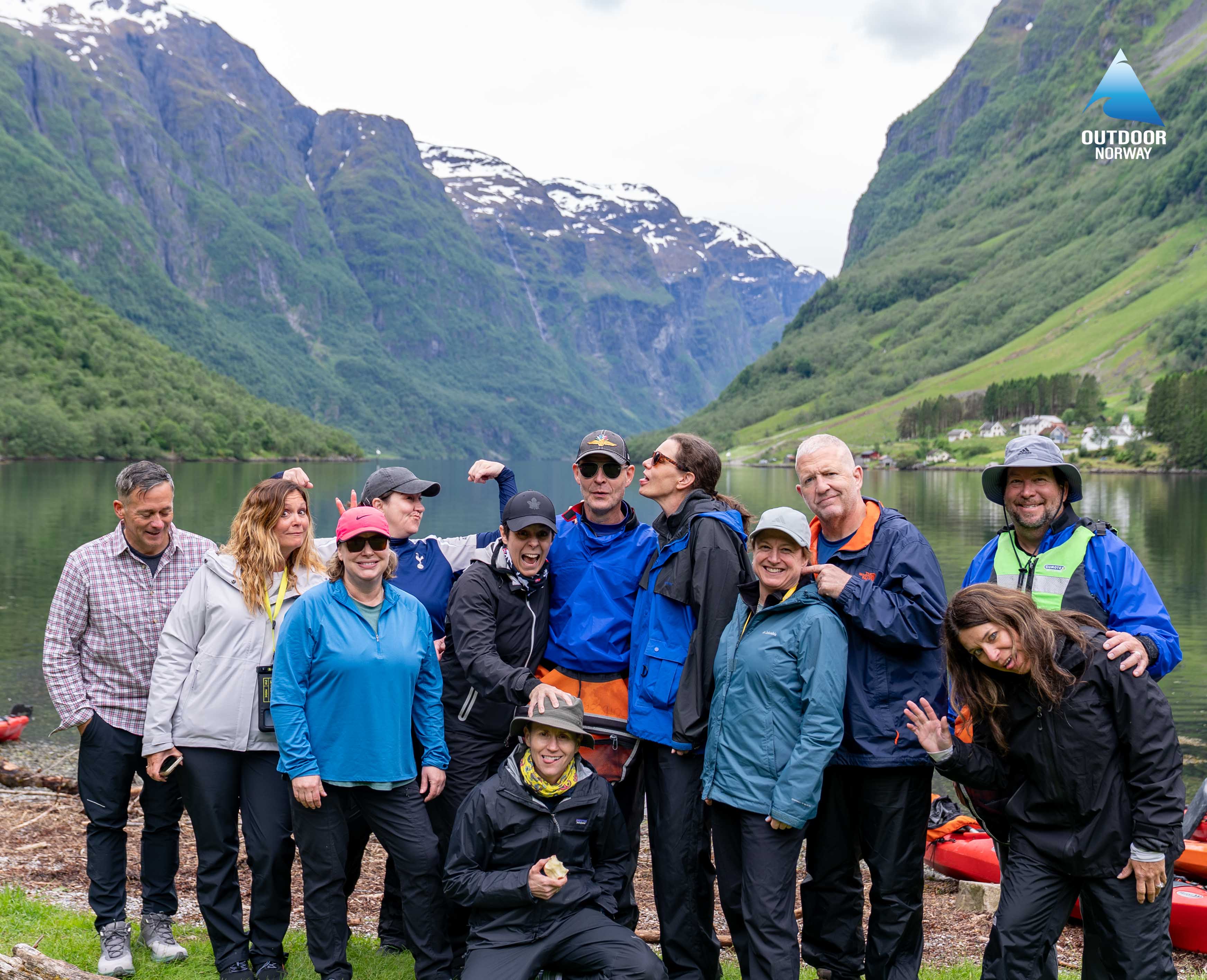 An Outdoor Norway kayak group with tourists and a local guide after a Naeroyfjord kayak tour