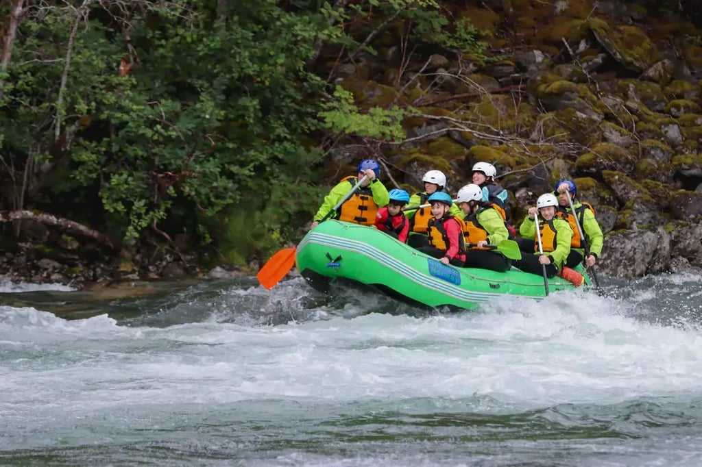 Family rafting enjoying and adventure