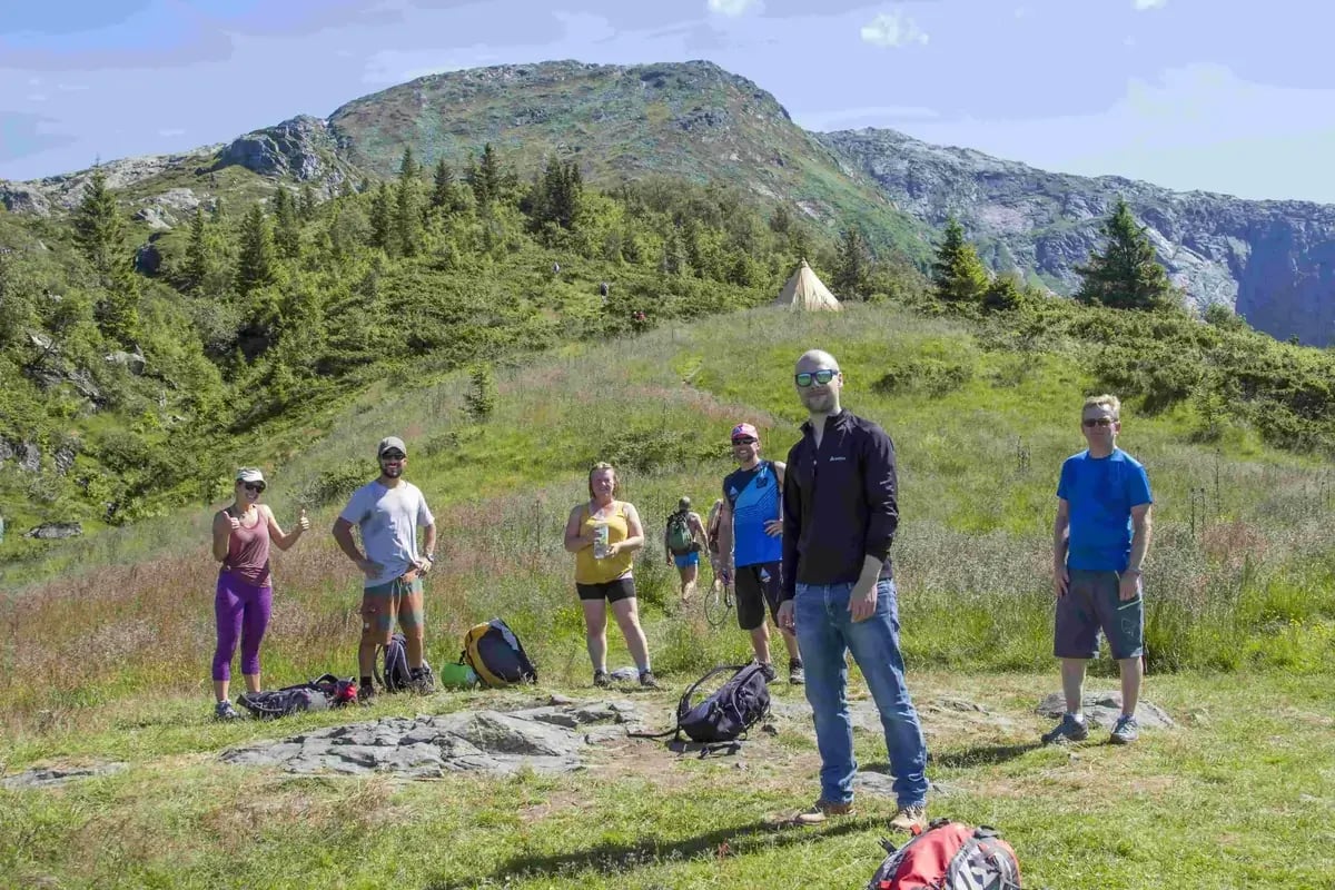 Group of hikers on a guided tour before taking on one of the best hiking trails in Voss, Norway