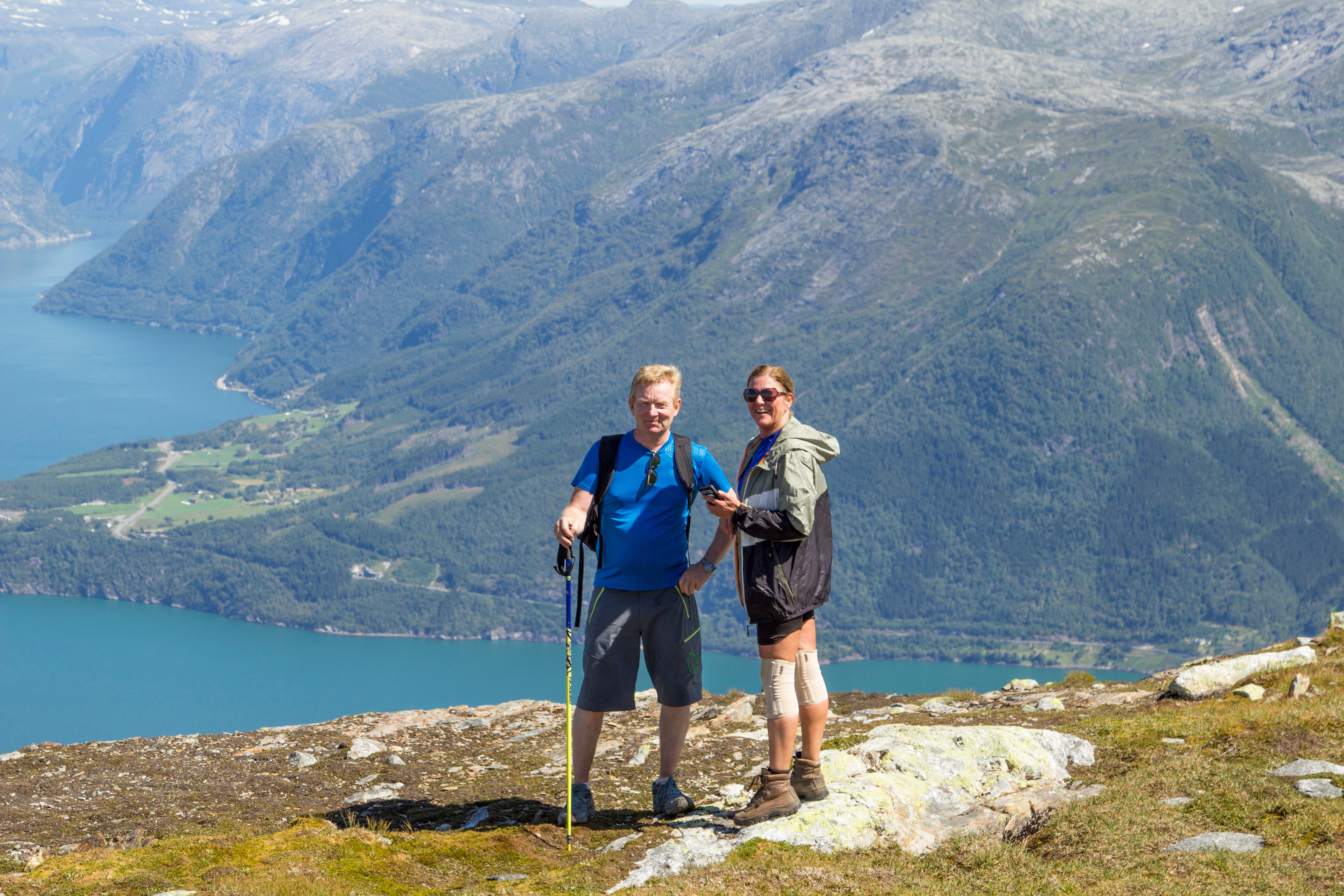 Hikers posing on Mount Oksen near Voss, Norway's adventure capital