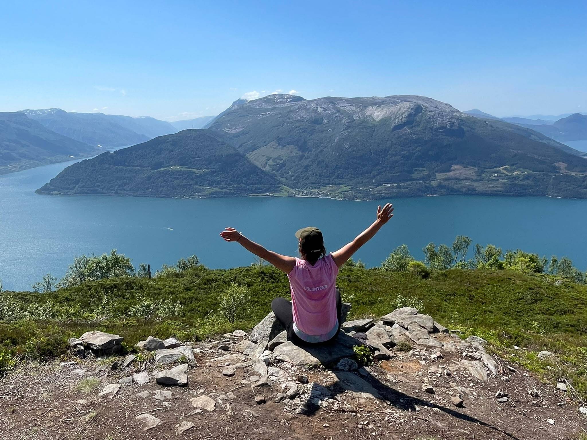 Woman posing on a fjord in Bergen, Norway