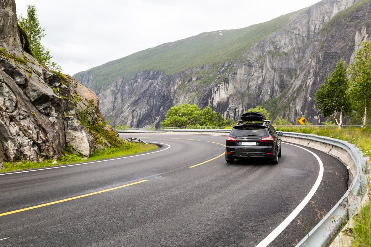 A car crossing Hardangervida on a journey from Oslo to Voss, Norway
