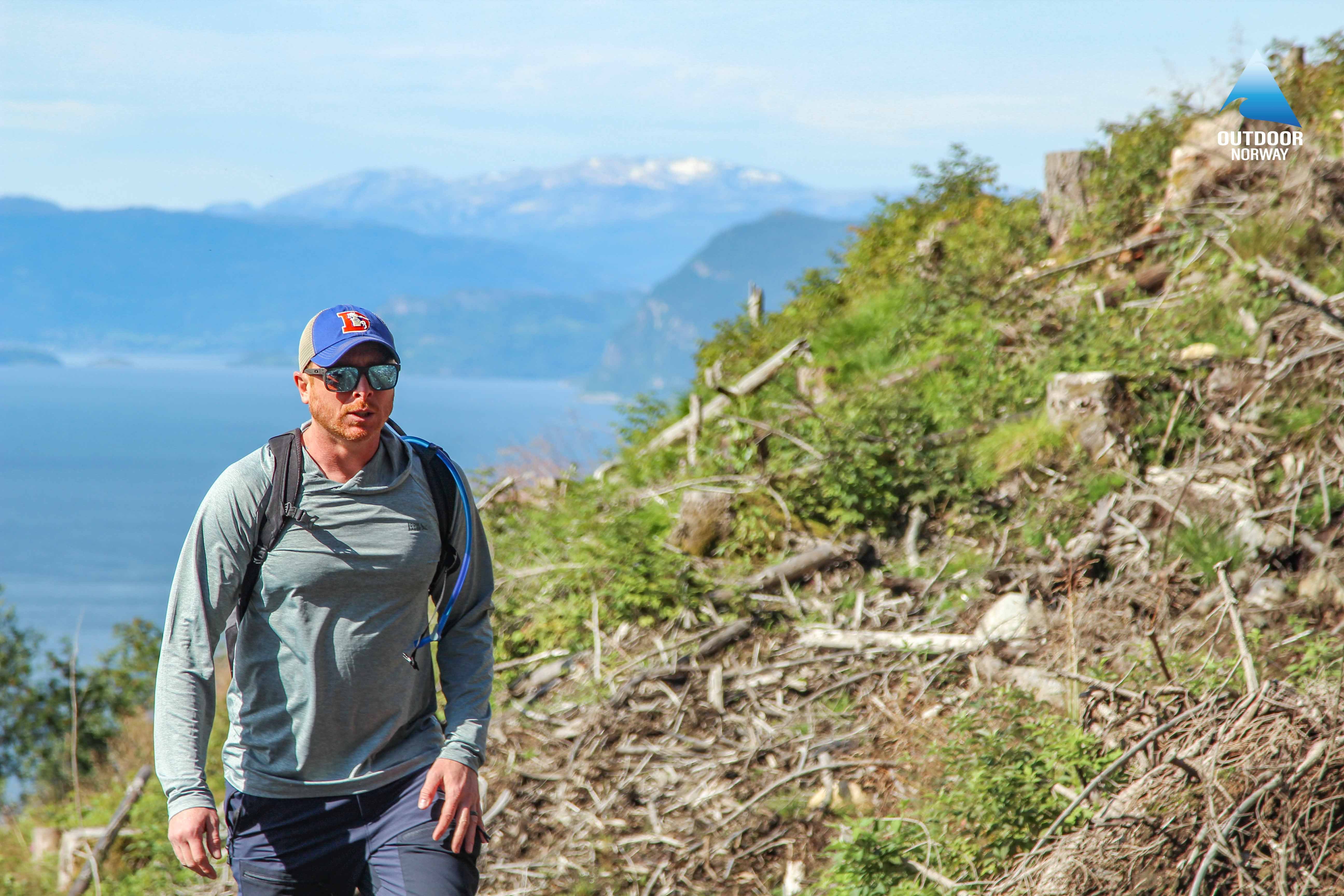 Man hiking on Hardangerfjord in the summer
