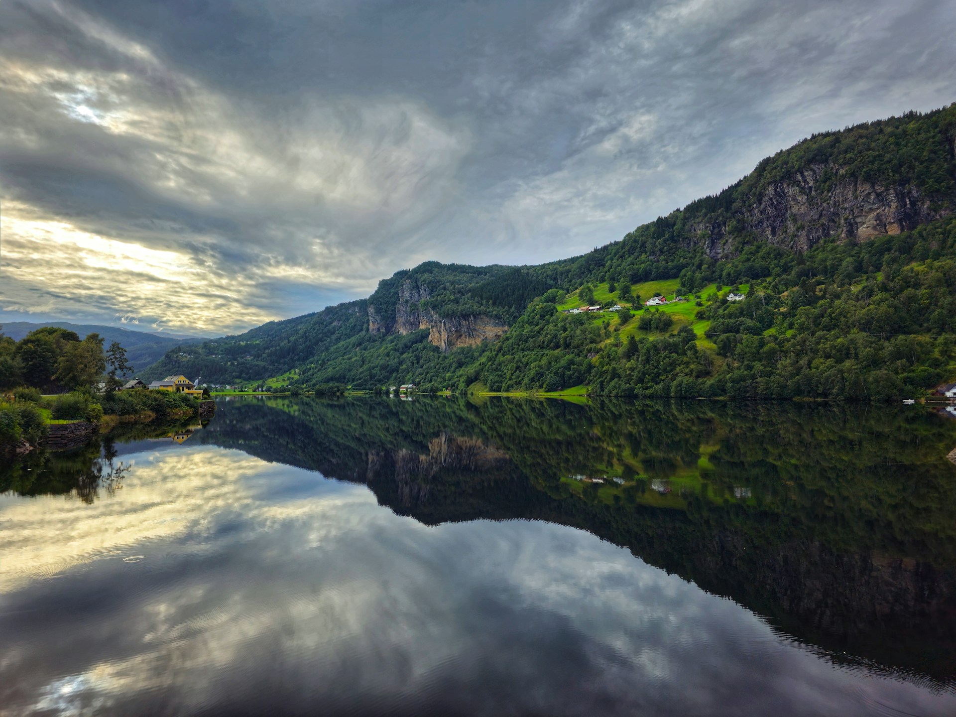 Lakeside views of Hardangerfjord on a cloudy day