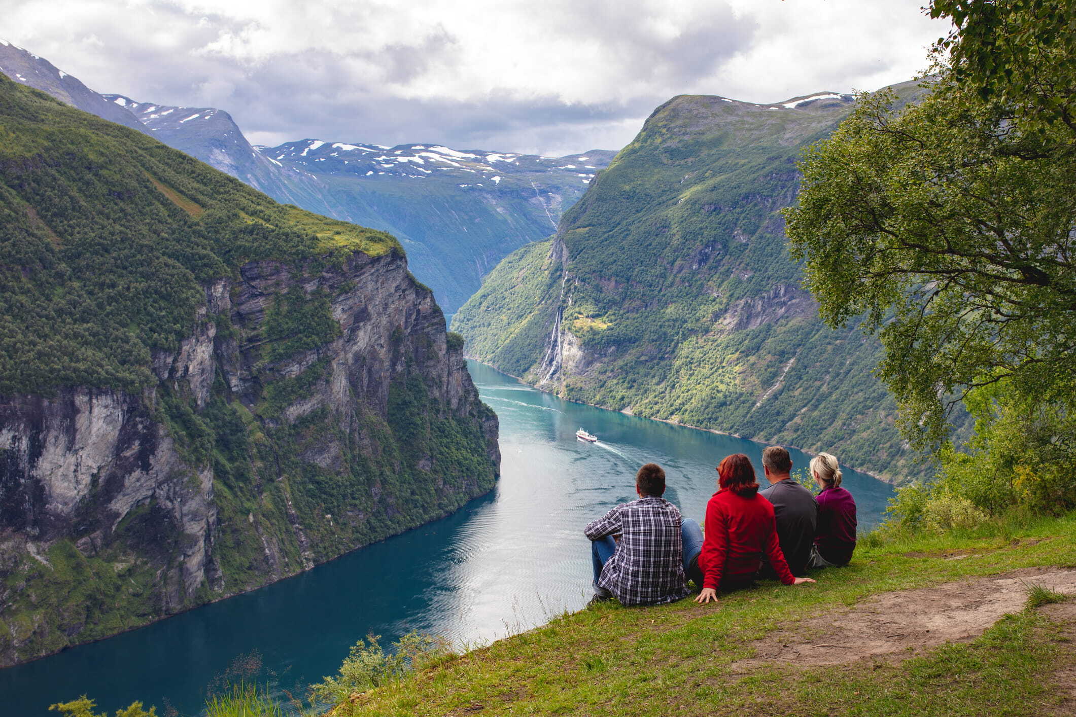 Hikers looking at Geirangerfjord, the most popular fjord in Norway