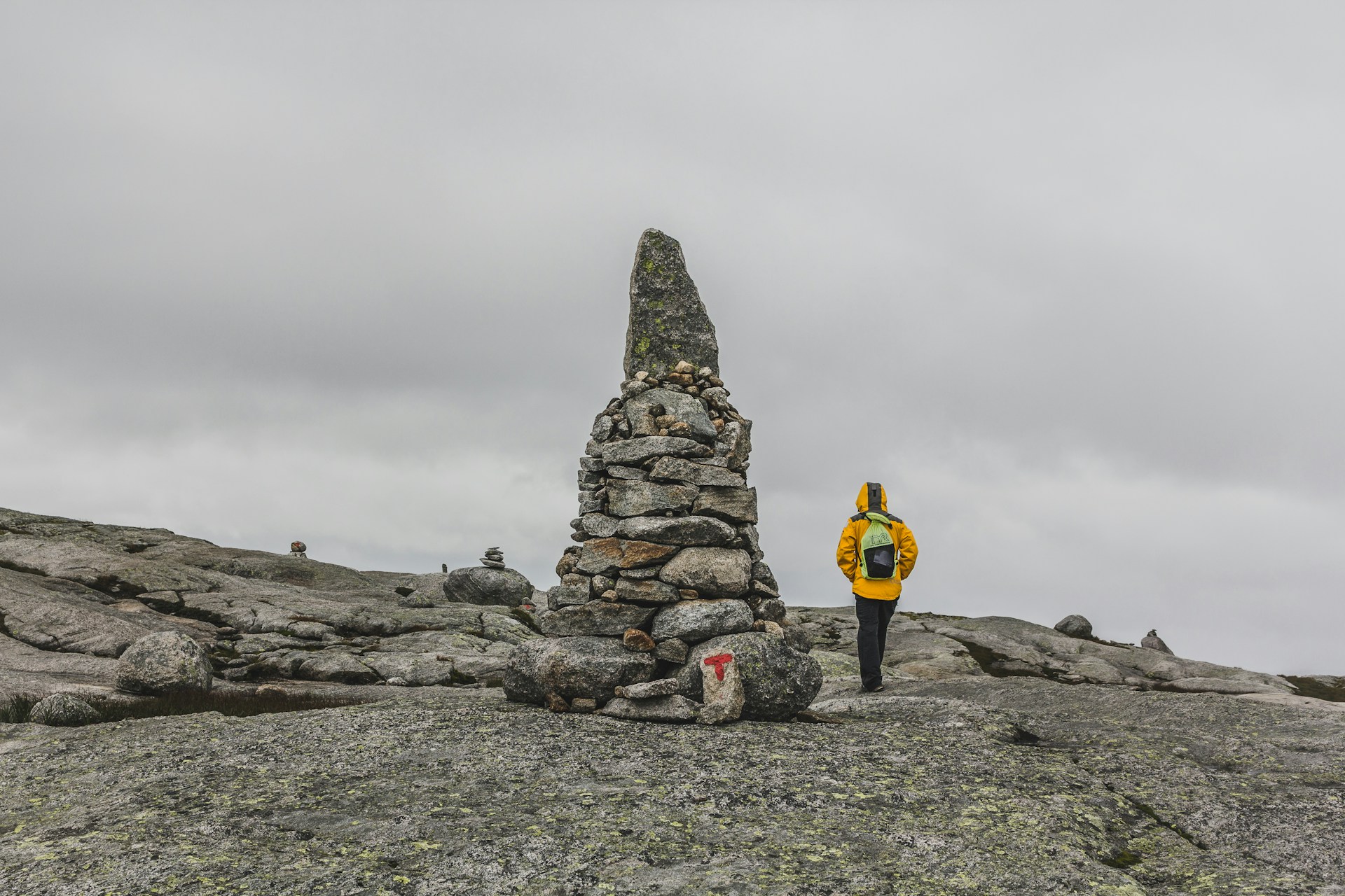 Hiker in Norway following a waypoint