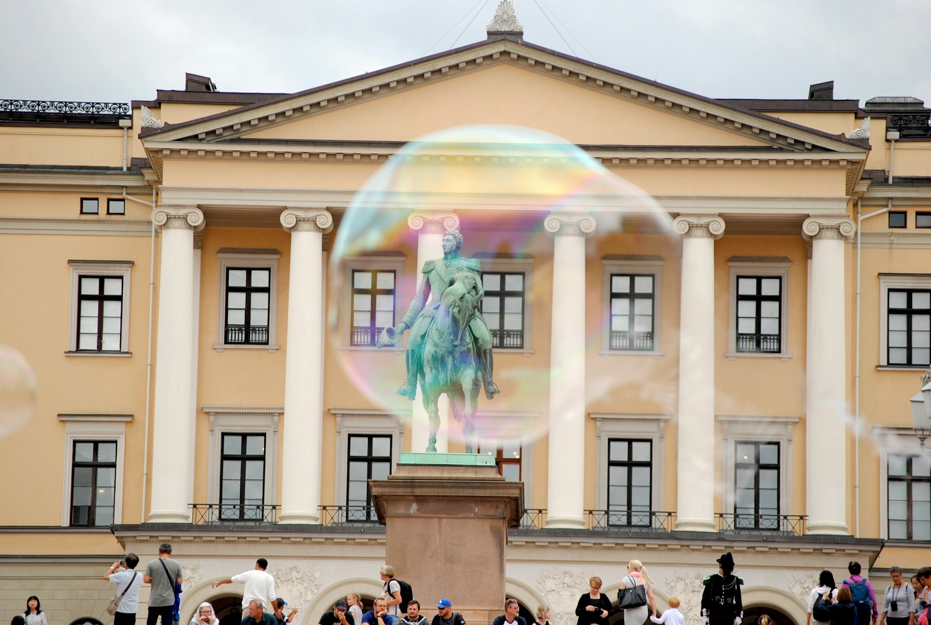 Tourists near an expensive museum in Oslo, Norway