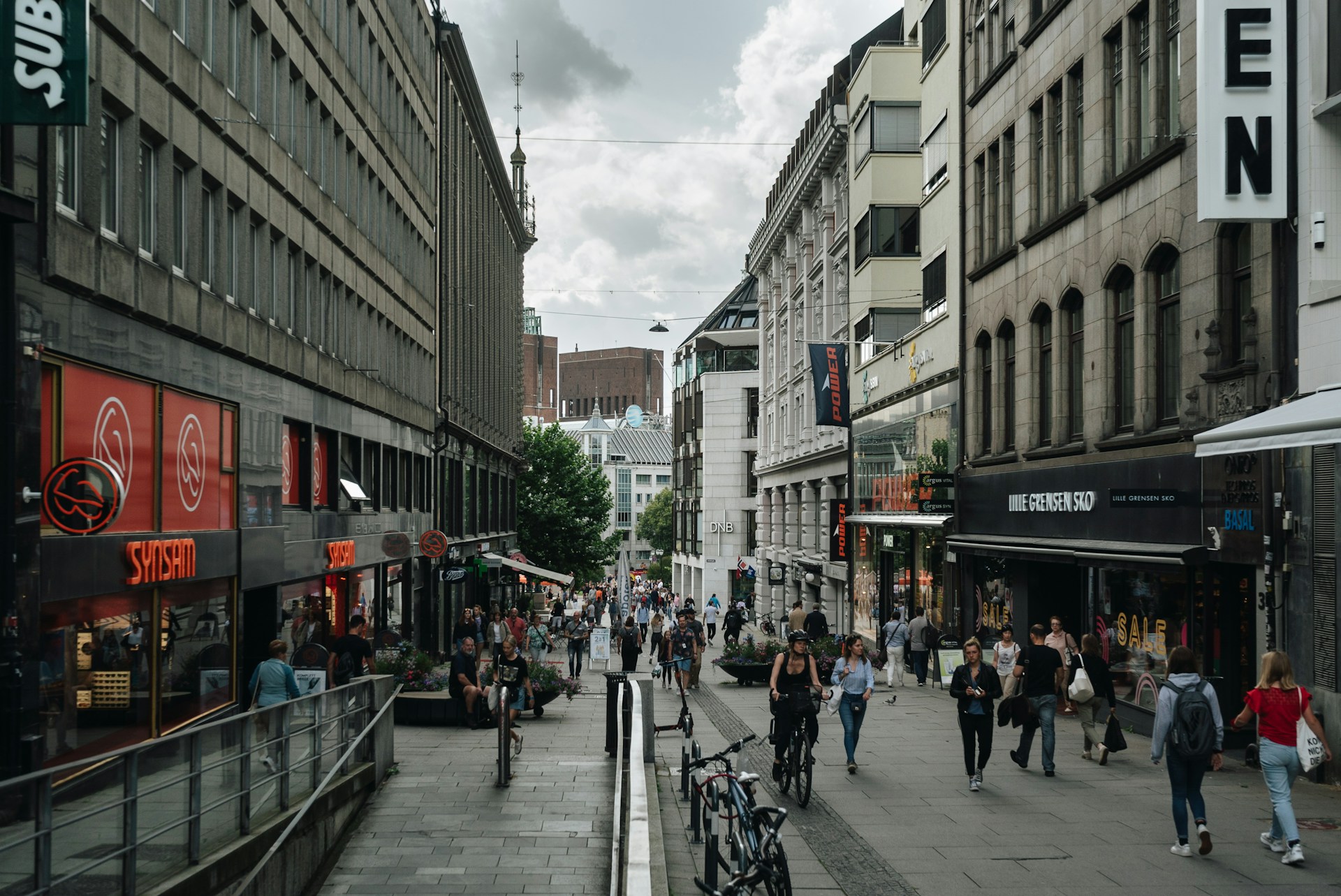 Visitors exploring Oslo, Norway, which is one of the most expensive places in Norway