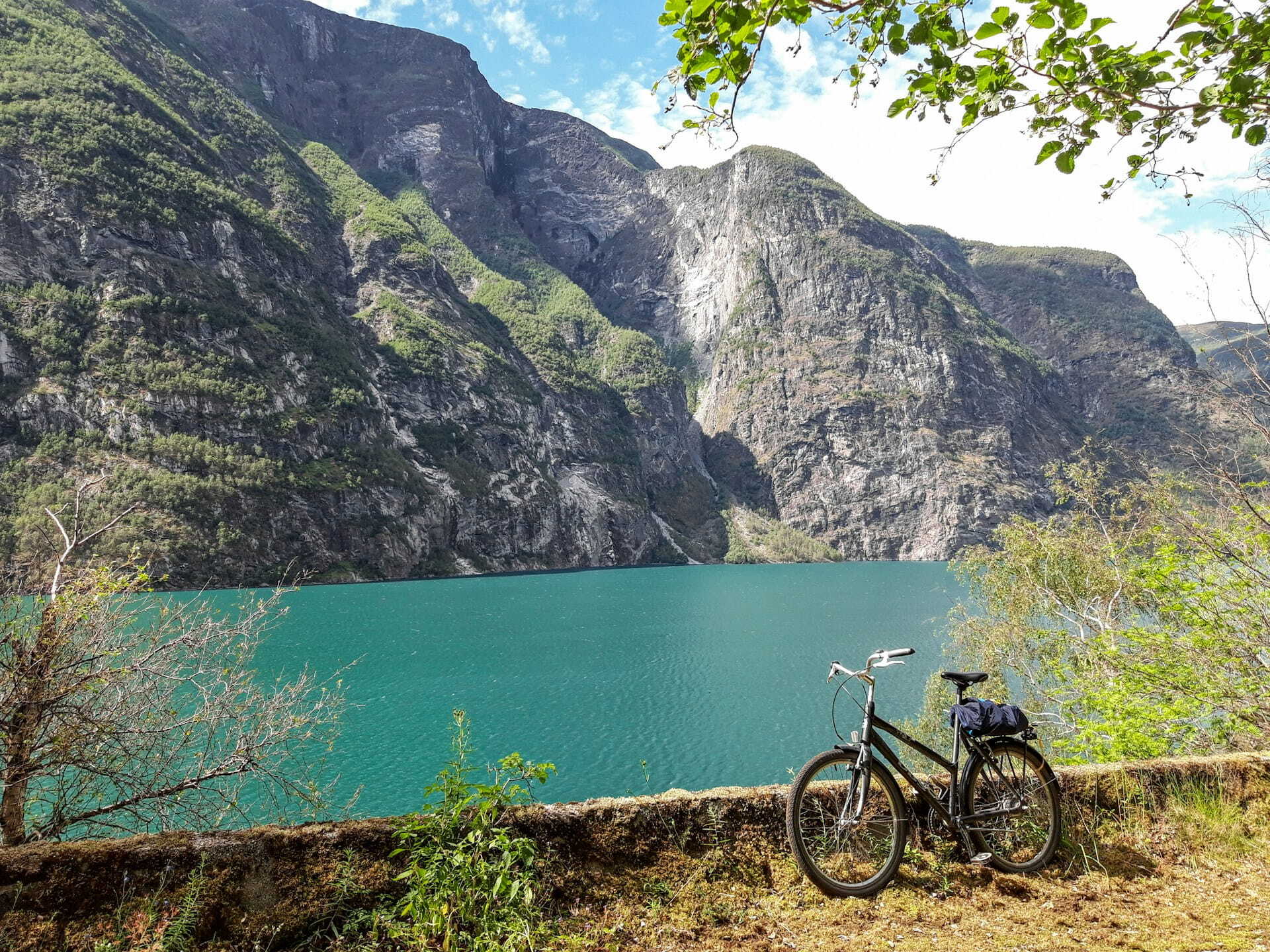 A bicycle resting near the Ovre Ardal lake in Norway