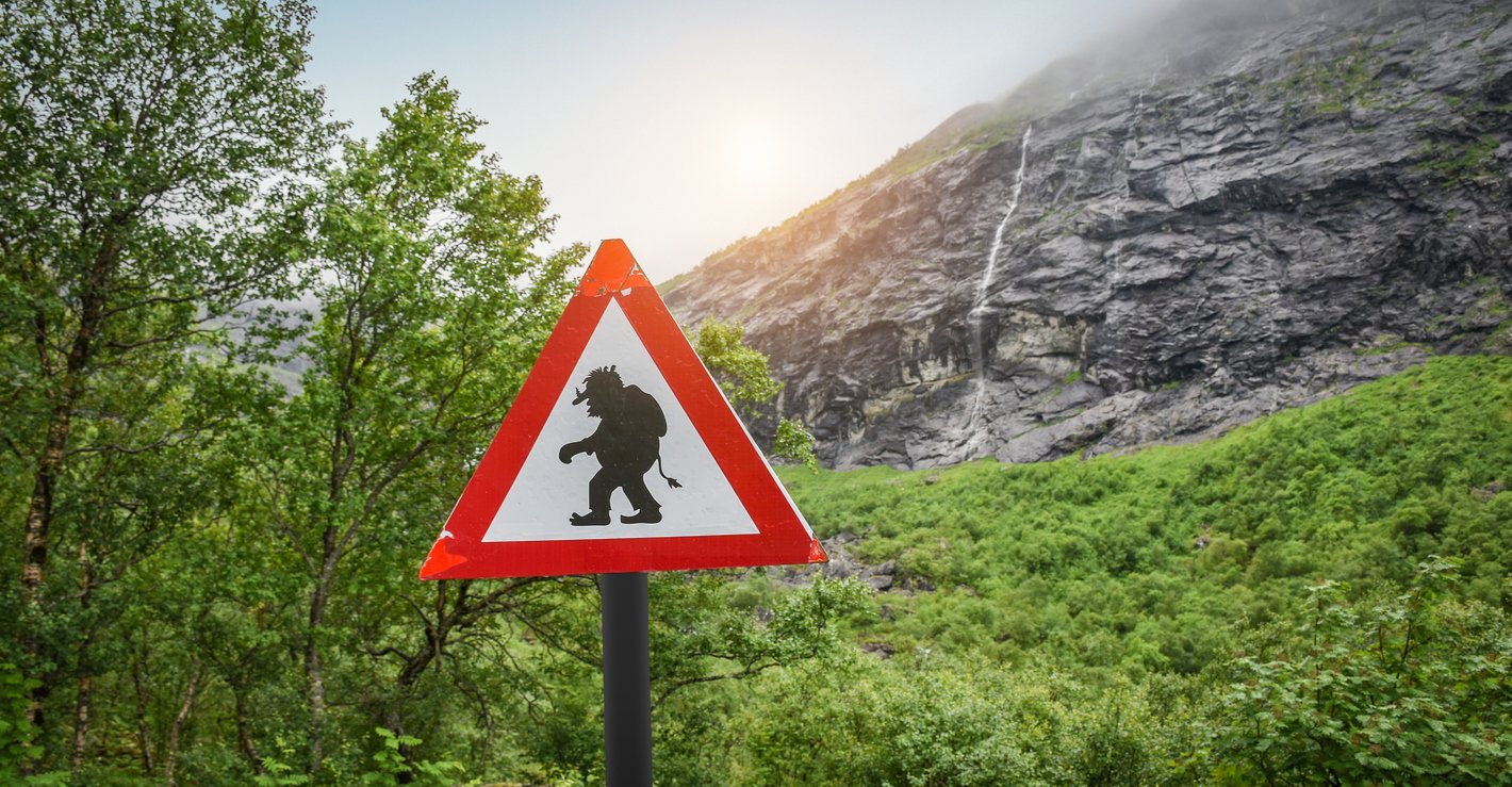 A road sign for Trolls in Norway