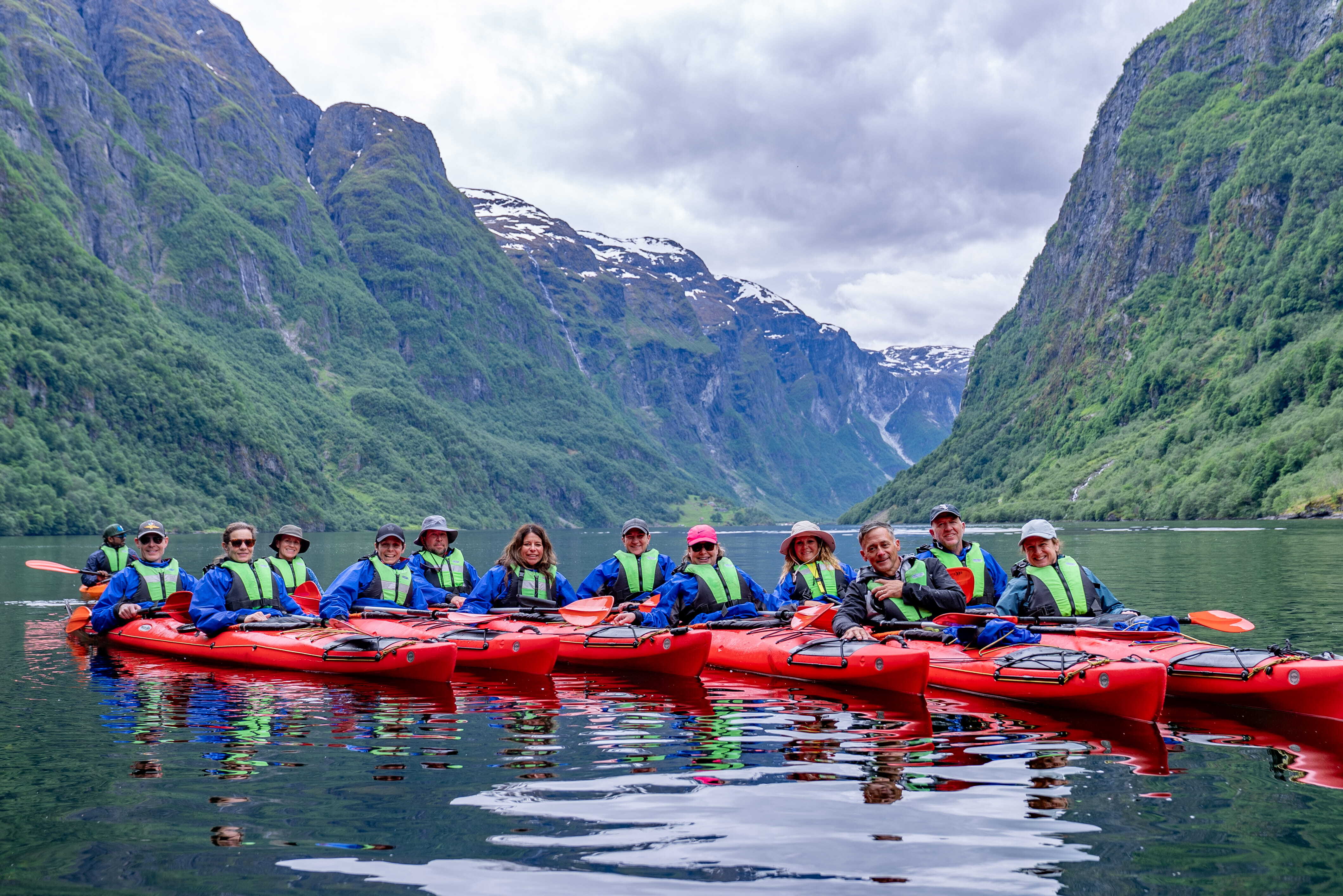 Group of tourists whitewater rafting in Voss, Norway