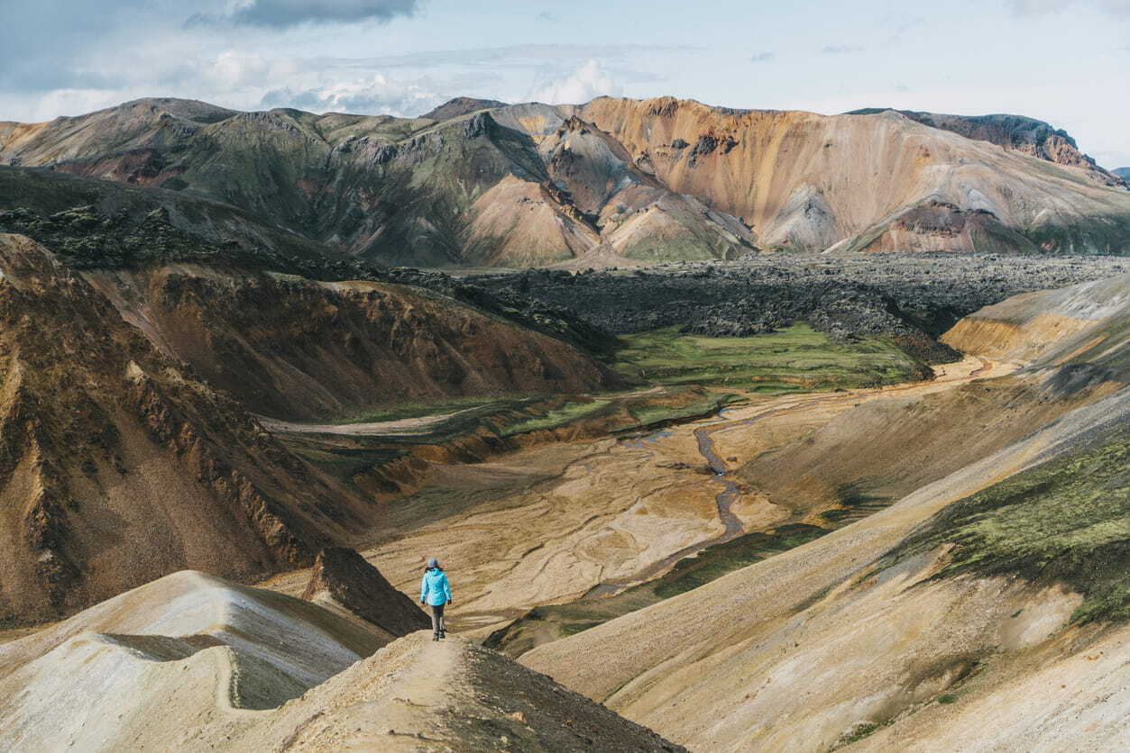 Woman hiking in Landmannalaugar on the Laugavegur trail in Iceland